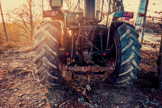 Tractor In Autumnal Countryside, Rear View