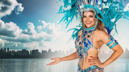Beautiful brazilian samba dancer wearing traditional costume and New York skyline