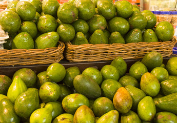 avocadoes for sale, in big baskets