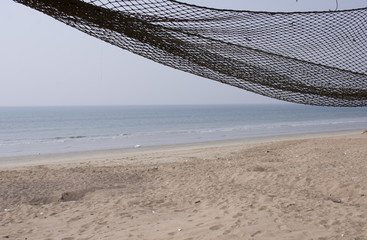 grey empty nets on the beach