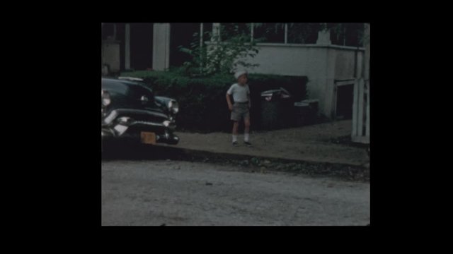 1956 50's family crosses the street, 1 woman is shocked and surprised