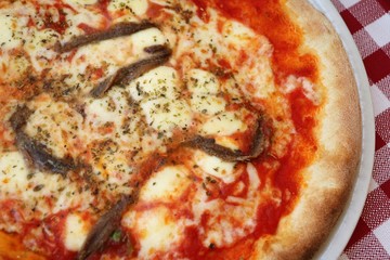 Handmade Italian pizza with anchovies, Italy