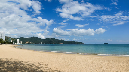 View of a tropical beach with blue sky in sunny day