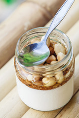 Glass jar with delicious yogurt