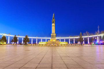 Harbin People Flood Control Success Memorial Tower Square at night. Located in Harbin City, Heilongjiang Province, China.