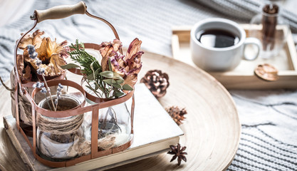 book with a cup of coffee on the bed in the home interior