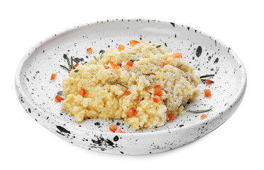 Plate with delicious risotto on white background