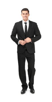 Handsome man in elegant suit on white background