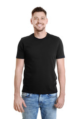 Young man in color t-shirt on white background. Mockup for design