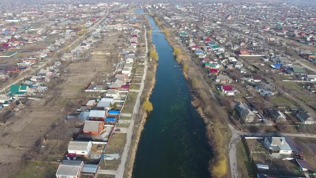 View from the top of the village. Streets without asphalt and single-storey houses. The Kuban village