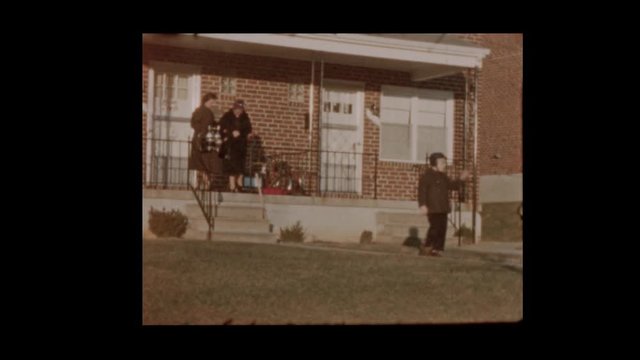 1958 Family gets into vintage antique car