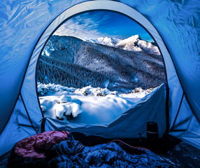 View from tent to the Tatra Mountains in winter © shaiith