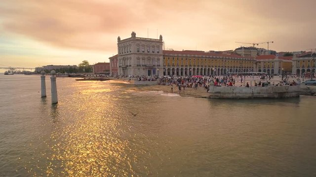 Aerial video in motion of sunset Commerce square, Lisbon, Portugal 4K drone