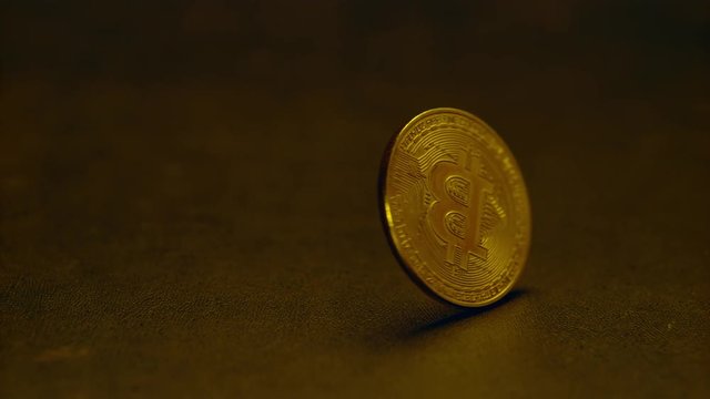 Bitcoin Spinning off right frame (Slow Motion) 