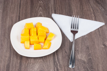 mango on the wooden background