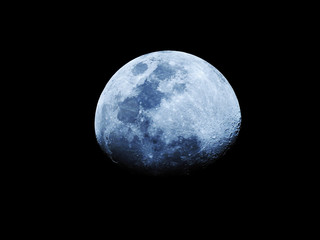 Moon phases as background / The Moon is an astronomical body that orbits planet Earth, being Earth's only permanent natural satellite. It is the fifth-largest natural satellite in the Solar System 