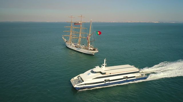 Portugal Lisbon 4k travel video. Aaerial view city yacht boat sailing ship sky