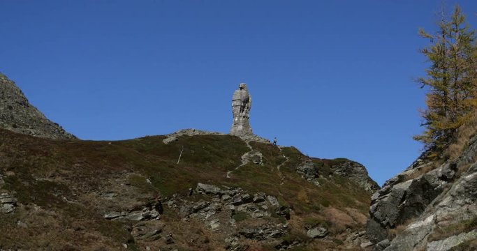 Eagle statue, Slow motion handheld view of a bird statue monument, on the top of simplon pass, on a sunny day, in Valais, Switzerland