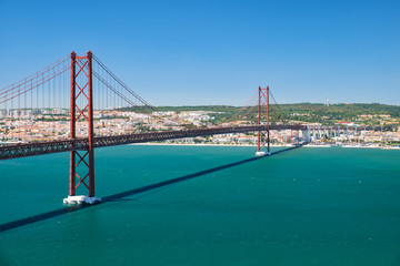 25 of April Bridge (Ponte 25 de Abril) – a suspension bridge over Tegus river. Lisbon. Portugal