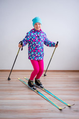 Fototapeta premium Teen girl skiing