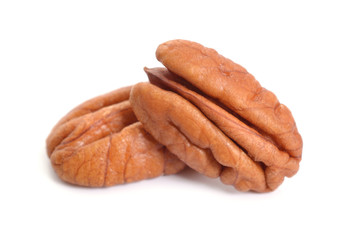Pecan nuts pile on white background isolated