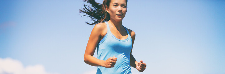 Sport woman running workout - active people exercising fitness Asian girl jogging panoramic banner...