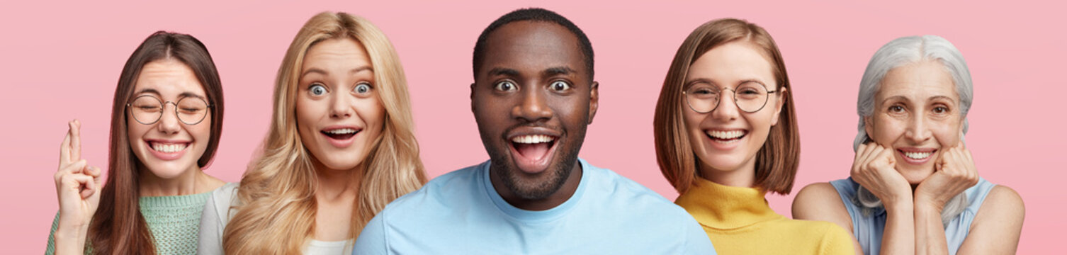 Five mixed race people express amazement and positive emotions. Black dark skinned male in centre with excited look. Brunette female crosses finger before exam. Elderly female smiles happily