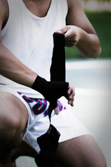 Asian young men thai boxing hand wraps for boxing, Boxing gloves