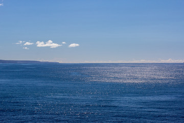 Fototapeta premium Blue shimmering sea and sky