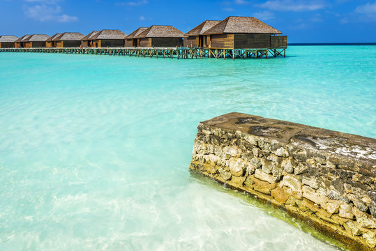 Luxury water villas on tropical Maldives island