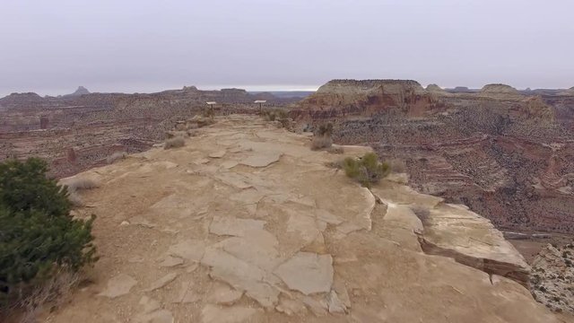 Flying low towards overlook of the Wedge and past the edge in the San Rafael Swell.