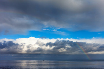 Obraz premium Rainbow over Baltic sea.
