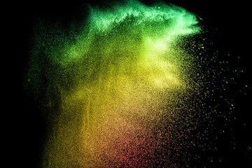 abstract multicolored dust splatter on white background.Freeze motion of color powder explosion on white background.