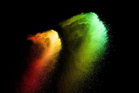 abstract multicolored dust splatter on white background.Freeze motion of color powder explosion on white background.