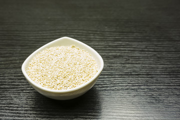 Sesame in a bowl on the table.