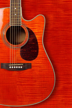 Musical instrument - Silhouette of a orange acoustic guitar