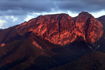 Poland, Tatra Mountains, Zakopane - Giewont, Szczerba and Dlugi Giewont peaks during sunset