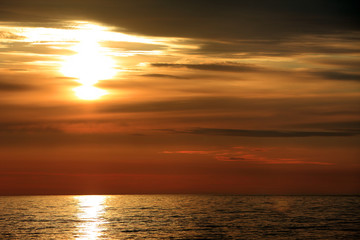 Colorful sunset over the Baltic Sea shore and beach in Rowy, Poland