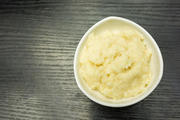 View from above. Grated horseradish in a bowl.