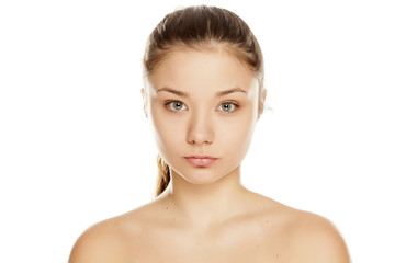 young girl without makeup on white background