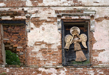 Angels with trumpets decoration on the old building