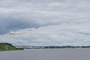 Old bridge over river view in summer