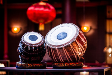 ethnic musical instrument tabla in the interior of the chill-out - obrazy, fototapety, plakaty