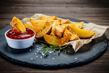 Chips on wooden background