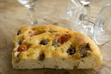 wedge of homemade barese focaccia
