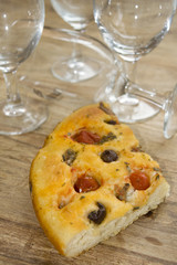 wedge of homemade barese focaccia