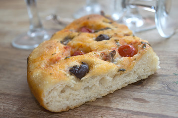 wedge of homemade barese focaccia