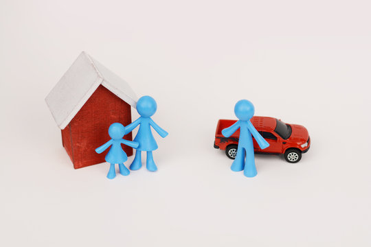 End of marriage concept with family miniature and goods division after divorce
