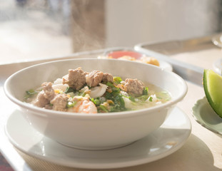 boiled rice in soup blow with shrimp and pork. Asia traditional food