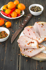 A sliced smoked meat with spice